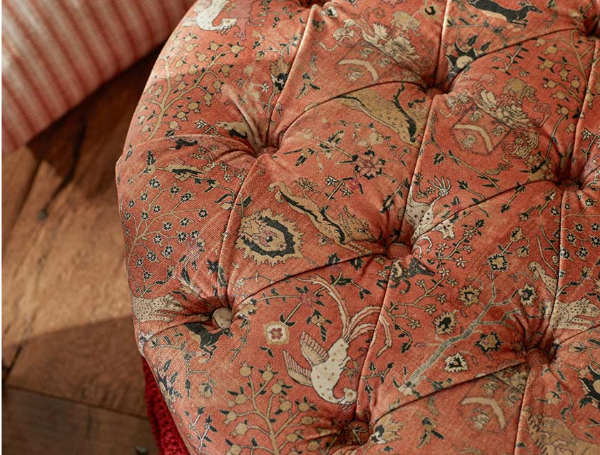 Burford Buttoned Footstool in V&A Threads of India Opulent Velvets Lahore Dynasty Flame detail